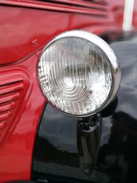 Close-up of red vintage car