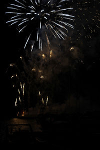 Firework display at night