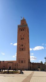 Low angle view of historical building against blue sky