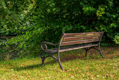 Old bench in the park in autumn.