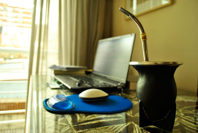 Close-up of coffee cup on table