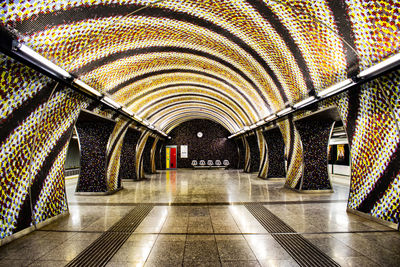 Interior of illuminated subway station