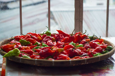 Peppers in basket at home