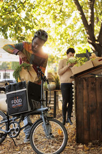 Portrait of senior man riding bicycle