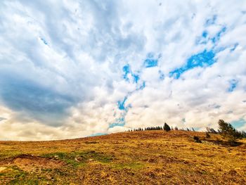 Low angle view of land against sky