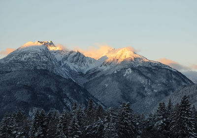 Scenic view of mountains against sky during winter