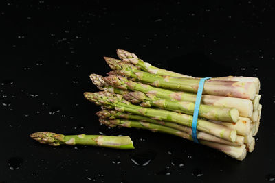 Close-up of food on table against black background