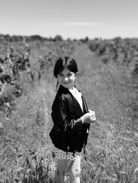 Woman standing on field