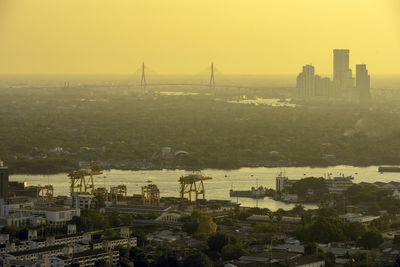 High angle view of city during sunset