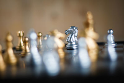 Close-up of chess pieces on board