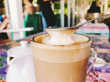 Close-up of coffee cup on table