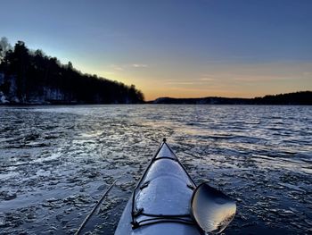 Scenic view of lake against sky during sunset