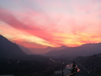 Scenic view of dramatic sky during sunset