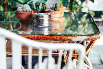 View of metallic container on table at cafe