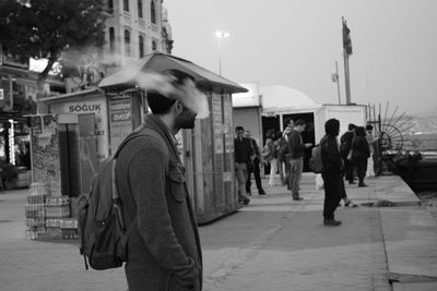 People walking on street in city