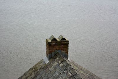 High angle view of house against sea