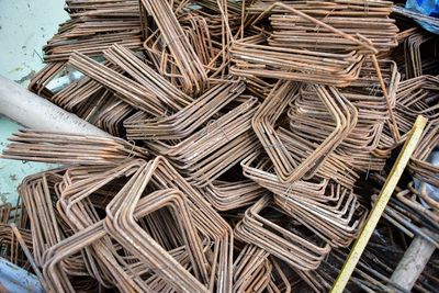 High angle view of stack of metal at construction site