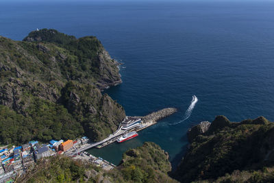 High angle view of sea and mountains