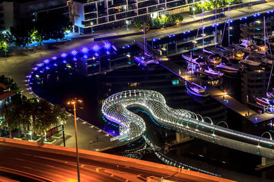 Illuminated ferris wheel at night