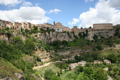 Panoramic view of town against sky