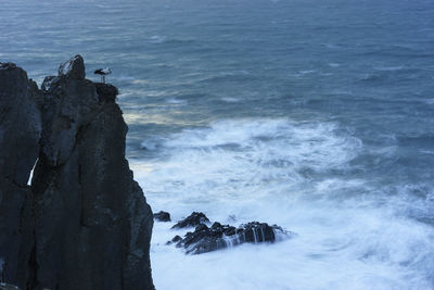 Rock formation and stork nest