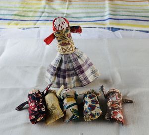 High angle view of woman sitting on bed