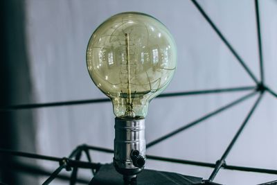 Close-up of illuminated light bulb