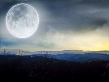 Scenic view of moon against sky at night