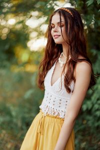 Young woman standing outdoors