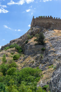 Low angle view of fort on mountain