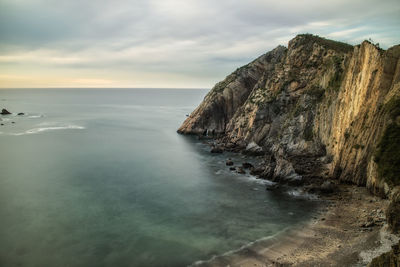 Scenic view of playa del silencio against sky