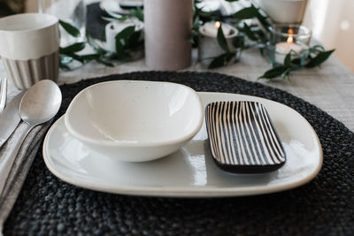 Dinner plates on a romantic table setting for two