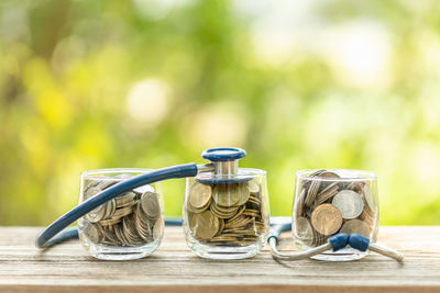 Close-up of coins on table