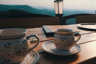 Close-up of coffee cup on table