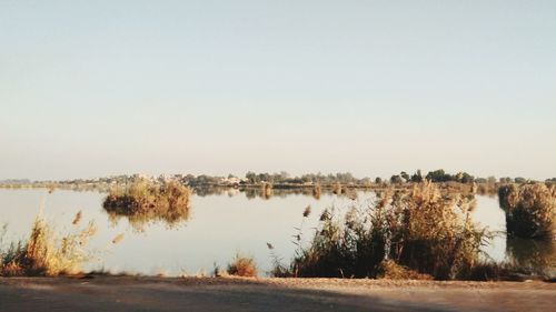 Scenic view of lake against clear sky