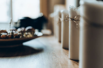 Close-up of candles on table