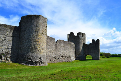 Old ruin building against cloudy sky