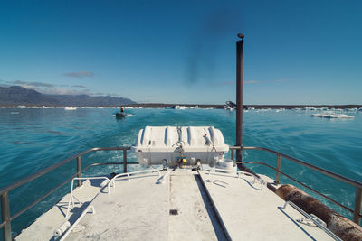 Close up ship stern in azure sea concept photo