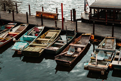 High angle view of fishing boats moored at harbor