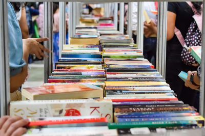 New delhi, india, september 09 2023 - variety of books on shelf inside a book-stall at delhi, india