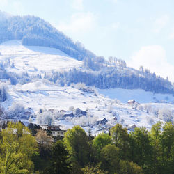 Scenic view of snowcapped mountain against sky