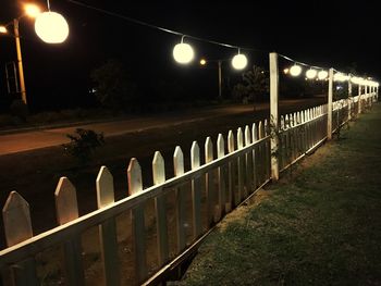 Illuminated street lights at night