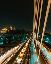 High angle view of illuminated buildings in city at night