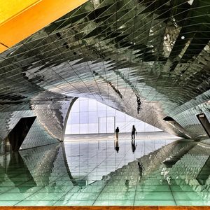 People walking on tiled floor