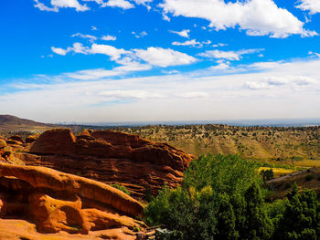 Aerial view of landscape against cloudy sky