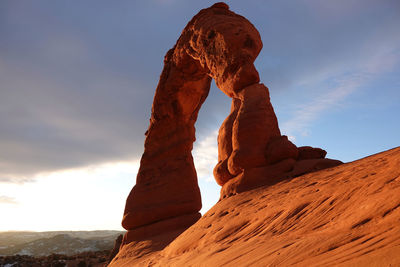 Scenic view of arch against sky at sunset