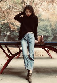 Young woman standing outdoors