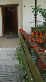 Footpath amidst buildings in city