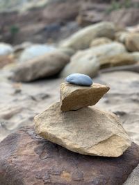 Close-up of stone stack on rock