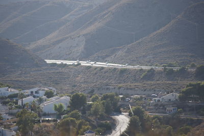 High angle view of city street and mountains